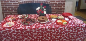 Wonderfully Valentines' themed snack table. Floral arrangement by one of our hostesses Janet S.