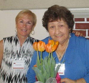 Our hostesses Ceme C. and Peggy C. with Peggy's centerpiece 